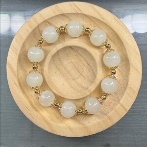 Elegant Gold and White Beaded Bracelet